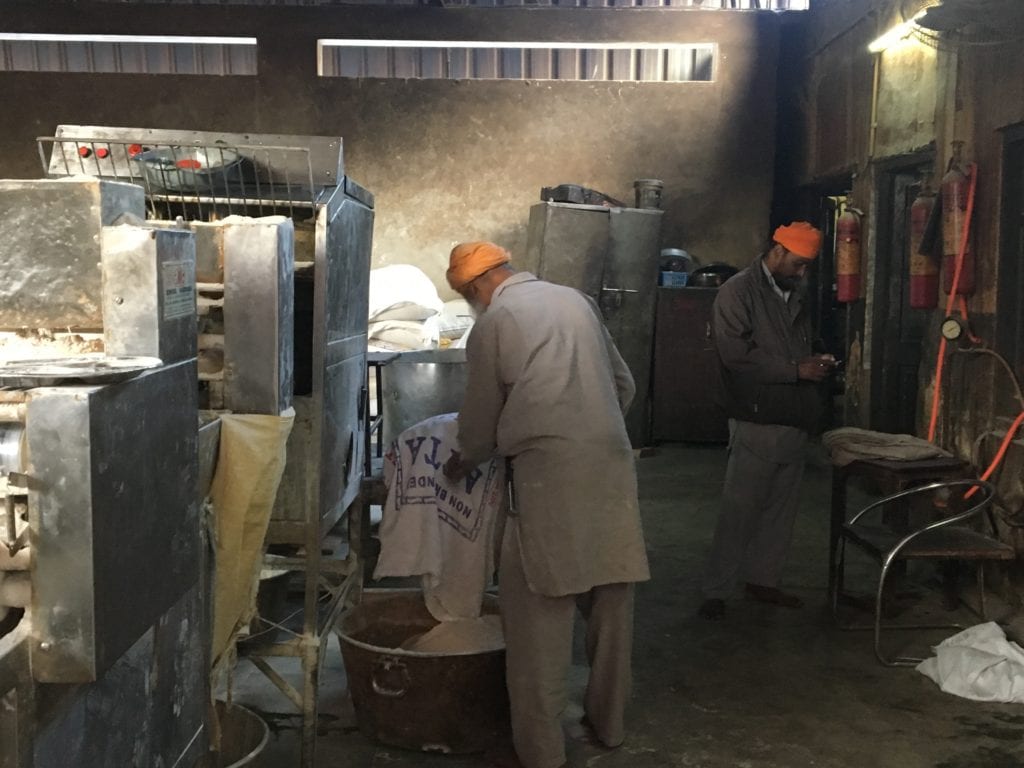 A Sikh making Chapati 