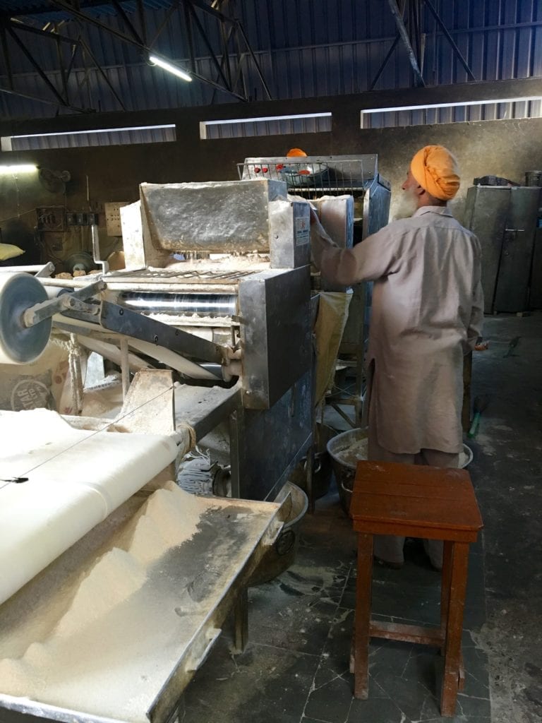 A Sikh making Chapati 