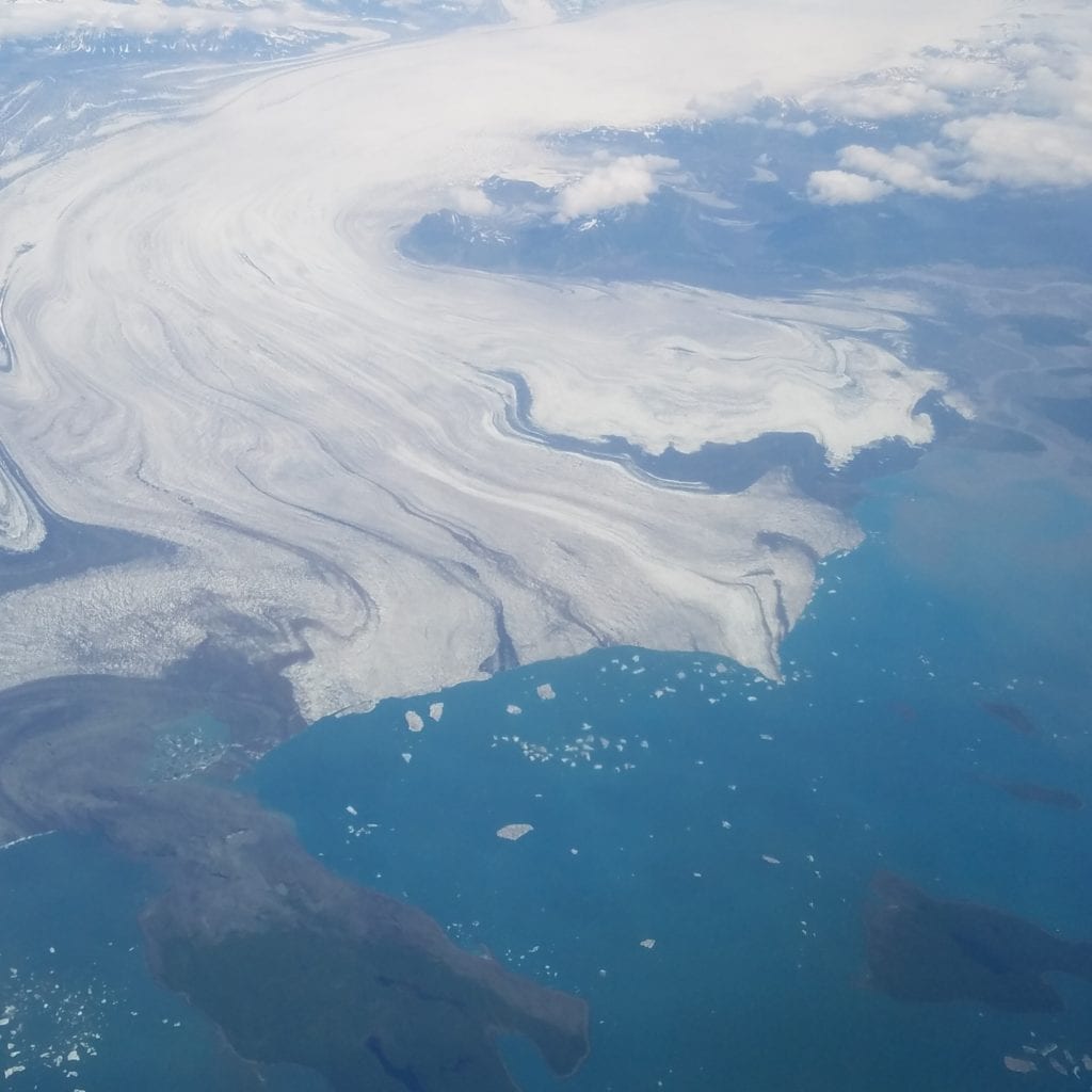 Glacier to lake with icebergs
