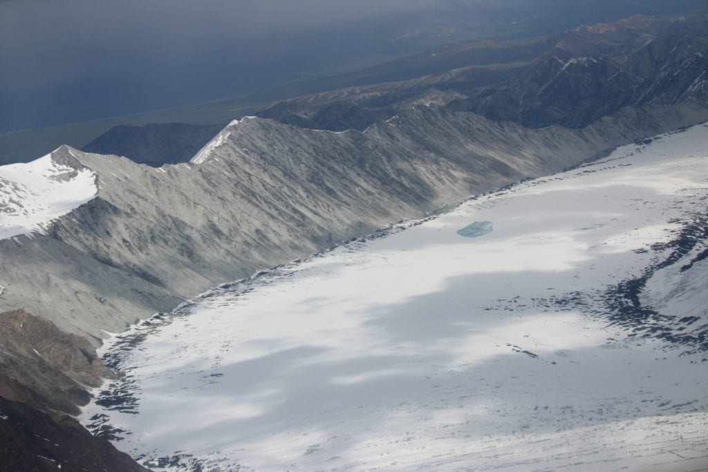 Sweep of the glacier with mountains &amp; moraine