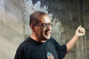 Maker of black pottery describing his craft 