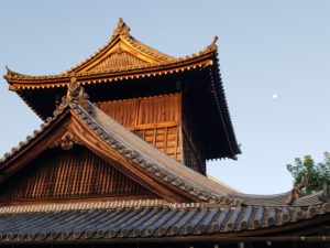 Honestly, I think this was up the street from Nishi Honganji (my records are unclear)...but see the full moon setting to the right of the building? Glorious.