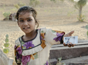Little girl holding her picture