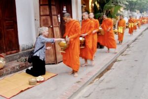 Laos: Monk's morning ritual 
